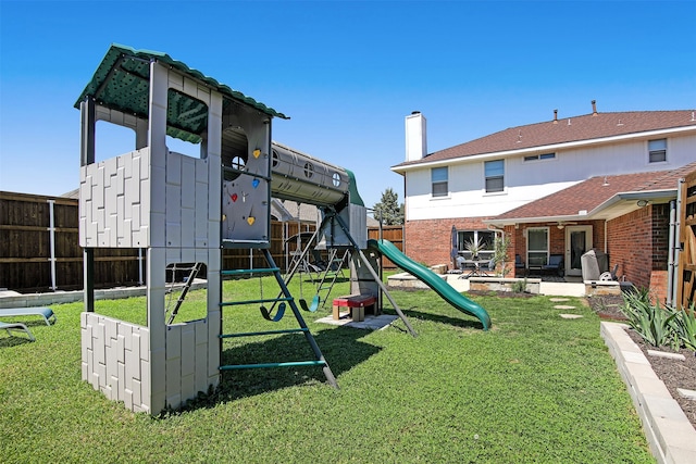 view of play area with a lawn