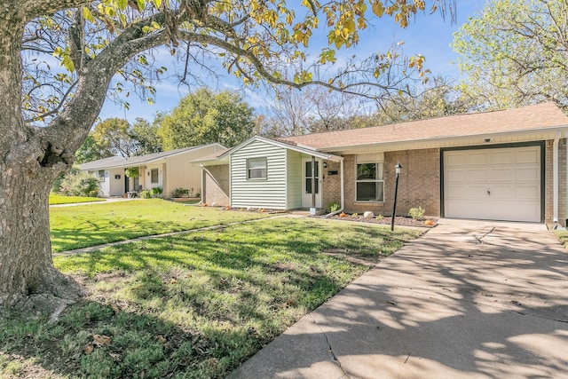 ranch-style home with a garage and a front lawn