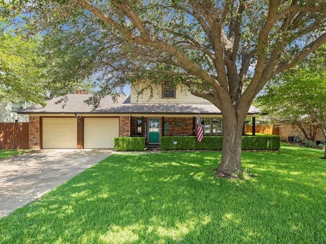 view of front facade featuring a garage and a front yard