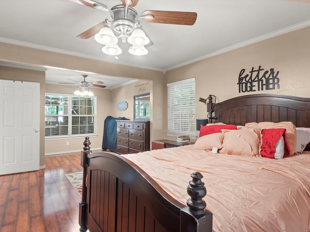 bedroom featuring wood-type flooring, ceiling fan, and ornamental molding