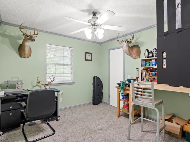 office with light carpet, a textured ceiling, ceiling fan, and ornamental molding