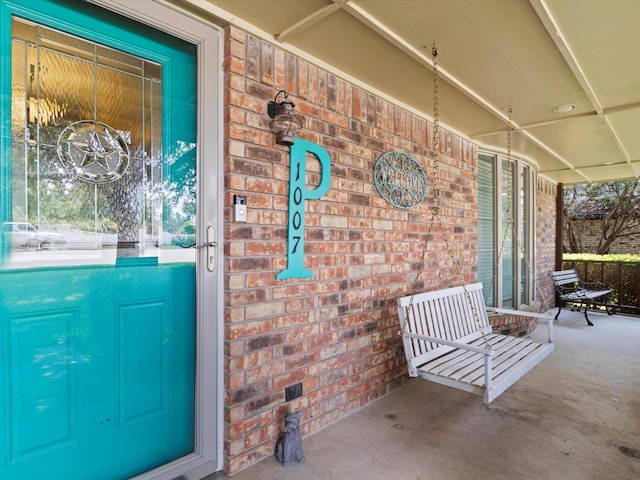 property entrance featuring covered porch