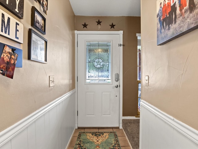 entryway featuring tile patterned flooring