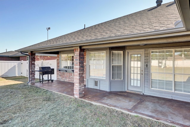 exterior space with a lawn and a patio area