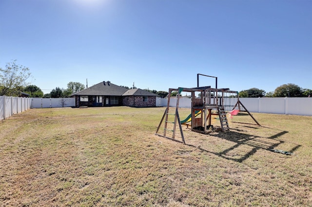 view of yard with a playground