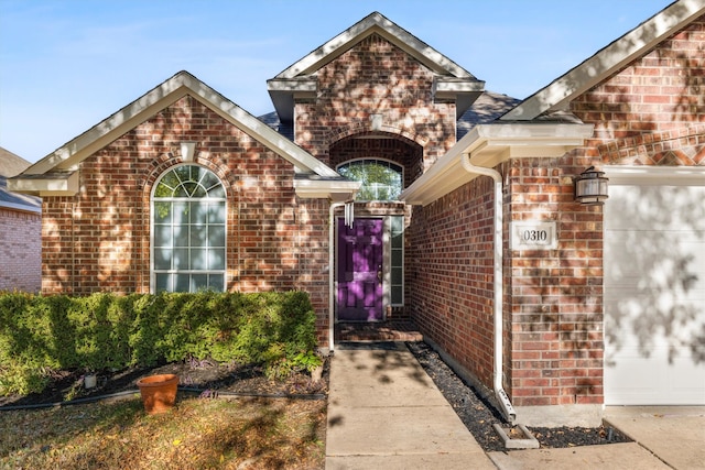 property entrance featuring a garage