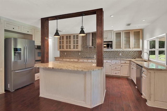 191 Old Perrin Rd, Sherman, TX 75092 - kitchen featuring stainless steel appliances, a sink, wall chimney range hood, a center island, and light stone counters