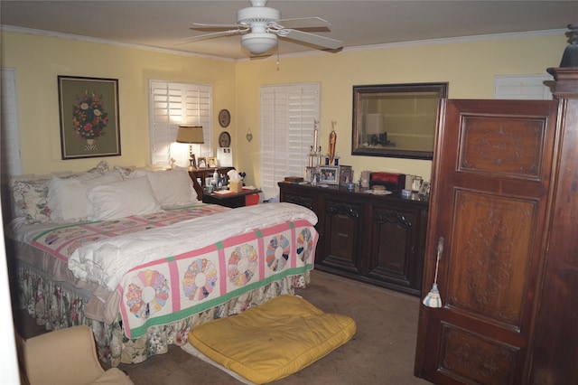 bedroom featuring ceiling fan, carpet floors, and ornamental molding