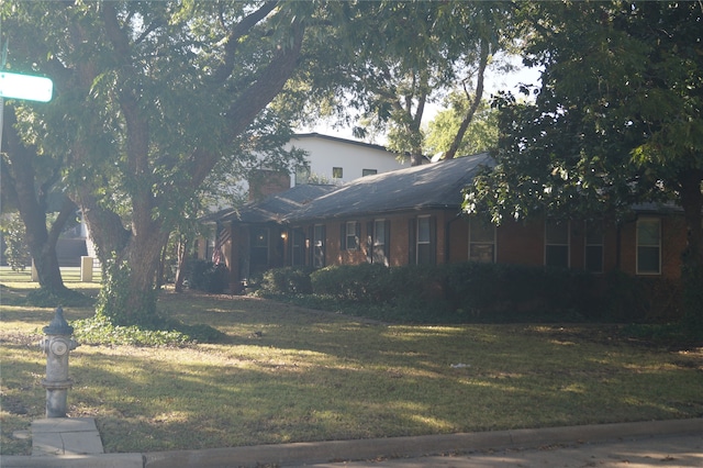 exterior space with a lawn