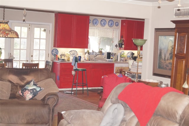 kitchen featuring sink, french doors, and ornamental molding