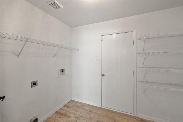 bathroom featuring ceiling fan, sink, wood-type flooring, and toilet