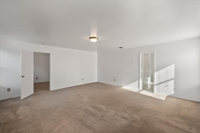 unfurnished room featuring ornamental molding and light wood-type flooring