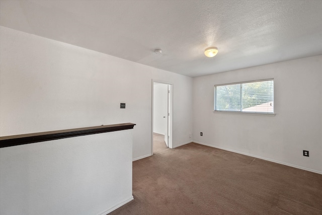 unfurnished room with light colored carpet