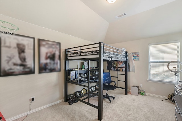 bedroom with light carpet, baseboards, visible vents, and lofted ceiling