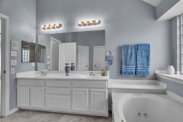 bathroom featuring a bathing tub and vanity