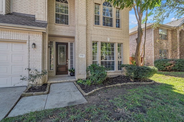 property entrance featuring a garage