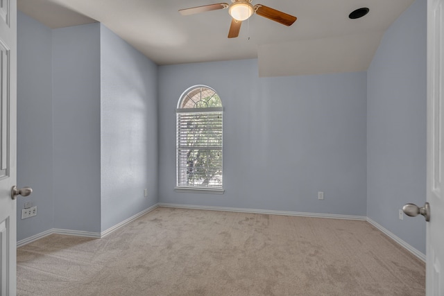 carpeted empty room with ceiling fan