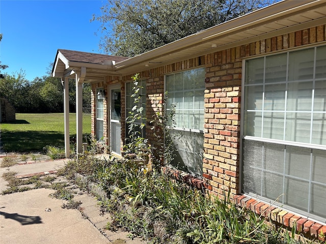 exterior space with a lawn