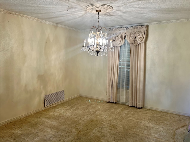 unfurnished dining area with a textured ceiling, carpet floors, crown molding, and a chandelier