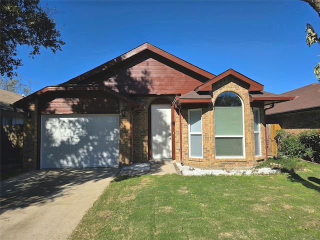 ranch-style house featuring a front yard and a garage