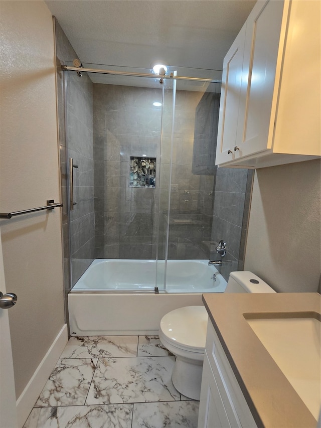 full bathroom featuring vanity, toilet, and bath / shower combo with glass door