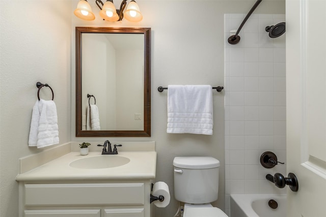 full bath with toilet, shower / bathing tub combination, and vanity