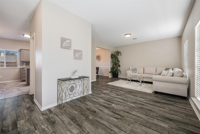 living room featuring dark hardwood / wood-style floors