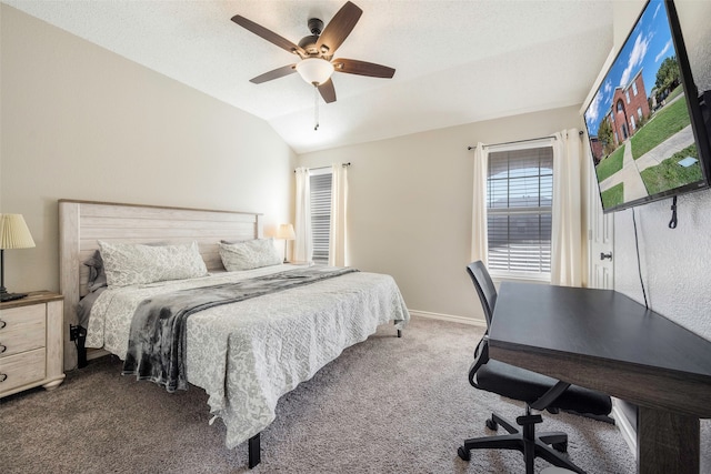 bedroom with ceiling fan, carpet floors, a textured ceiling, and vaulted ceiling