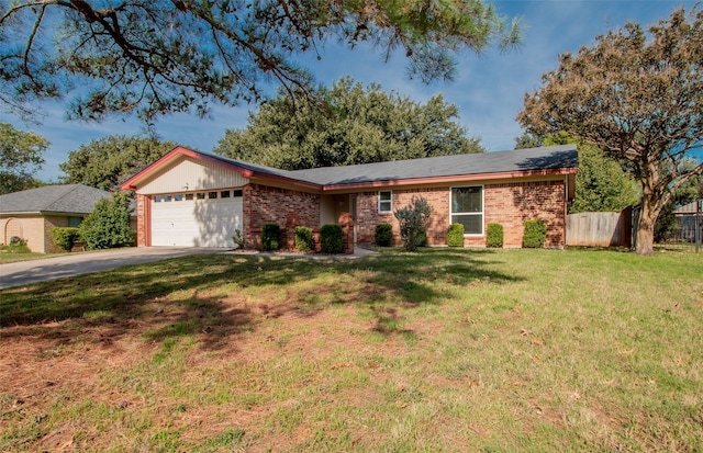 ranch-style house featuring a garage and a front yard