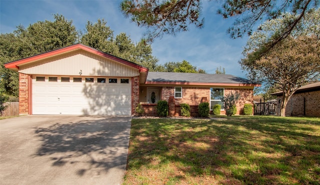 ranch-style house with a front yard and a garage