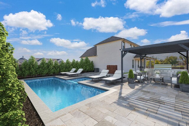 view of pool with a patio area and exterior kitchen