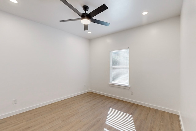 unfurnished room with light hardwood / wood-style flooring and ceiling fan