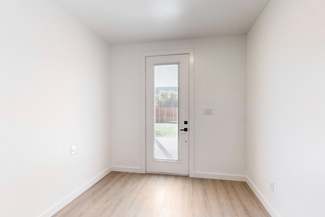 doorway to outside featuring light hardwood / wood-style floors