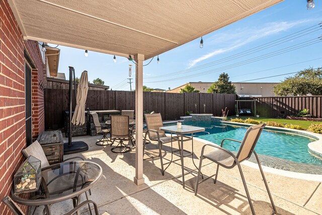 view of pool with a patio area