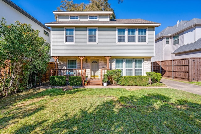 view of front of house with a front lawn