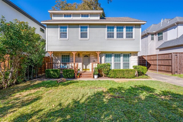 view of front of house with a front lawn