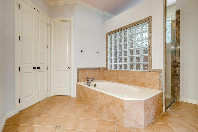 bathroom with tile patterned flooring, separate shower and tub, and crown molding