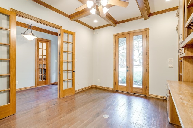 doorway to outside with french doors, hardwood / wood-style flooring, and beam ceiling