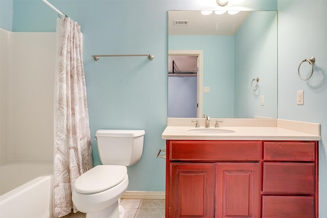 full bathroom featuring tile patterned flooring, vanity, shower / tub combo, and toilet