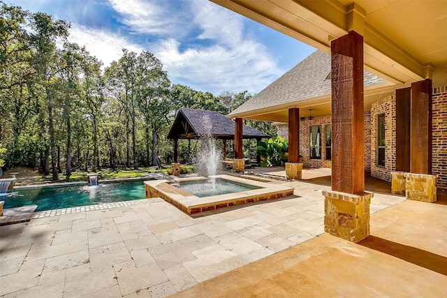 view of swimming pool featuring a gazebo and pool water feature