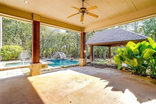 view of patio / terrace featuring a gazebo, pool water feature, and ceiling fan