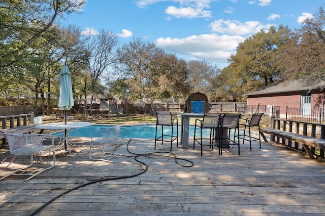 view of pool featuring a wooden deck