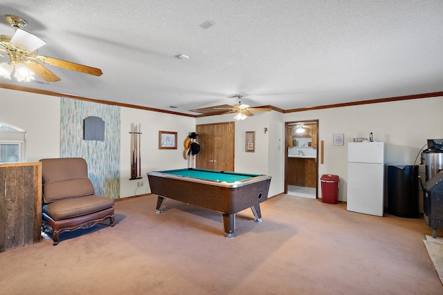 playroom with ceiling fan, light colored carpet, a textured ceiling, and billiards