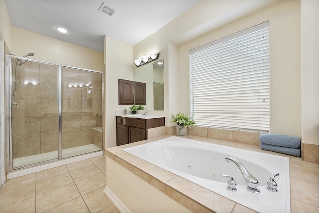 bathroom with separate shower and tub, tile patterned flooring, and vanity