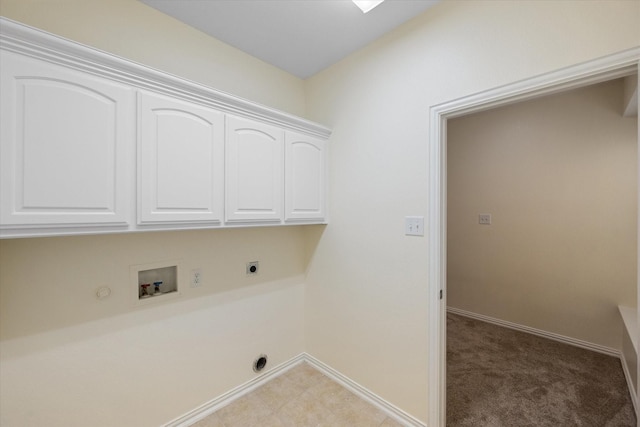 laundry room featuring cabinets, washer hookup, light carpet, gas dryer hookup, and electric dryer hookup