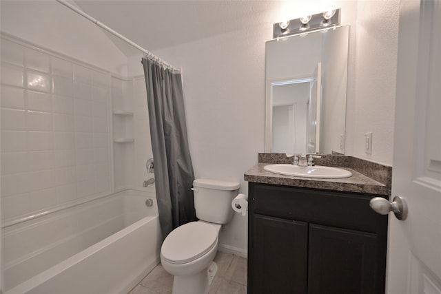 full bathroom featuring tile patterned flooring, shower / tub combo with curtain, vanity, and toilet