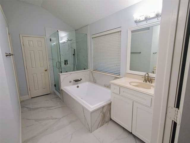 bathroom featuring shower with separate bathtub, vanity, a textured ceiling, and vaulted ceiling