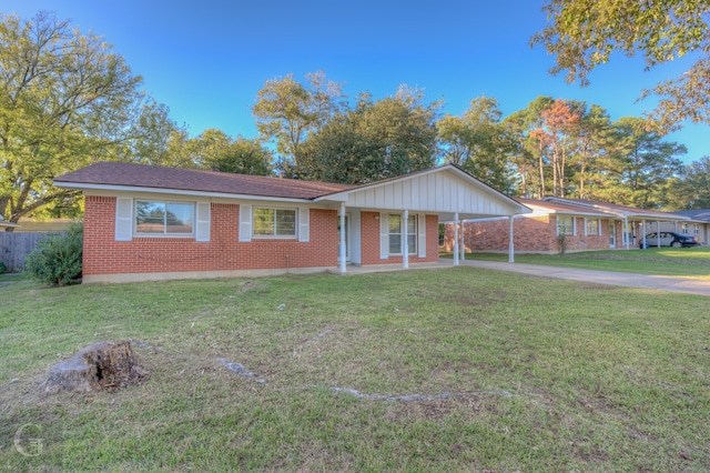 single story home with a porch and a front yard