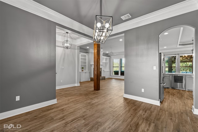 unfurnished dining area with crown molding, ceiling fan, and dark wood-type flooring