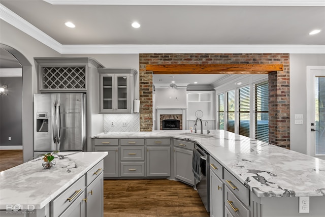 kitchen featuring gray cabinets, sink, stainless steel appliances, and dark hardwood / wood-style floors